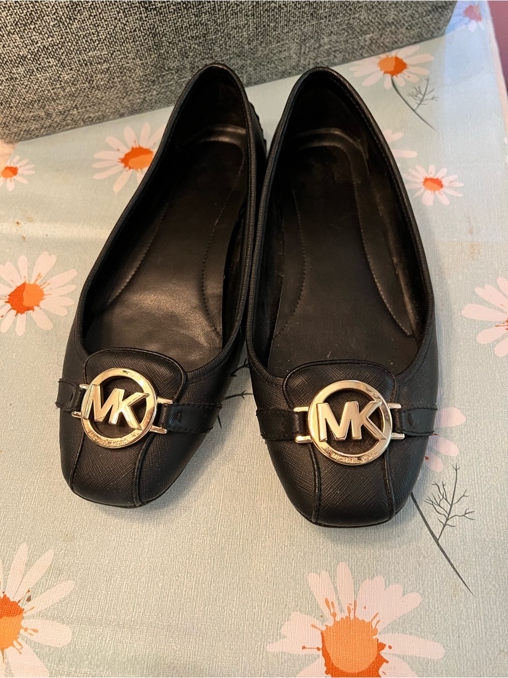 Michael Kors Black Leather Flats with Gold MK Emblem
